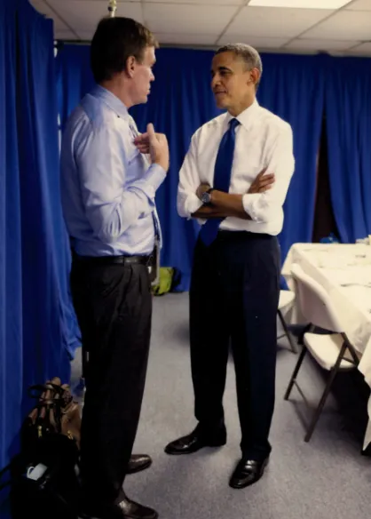 Senator Warner talking with President Obama